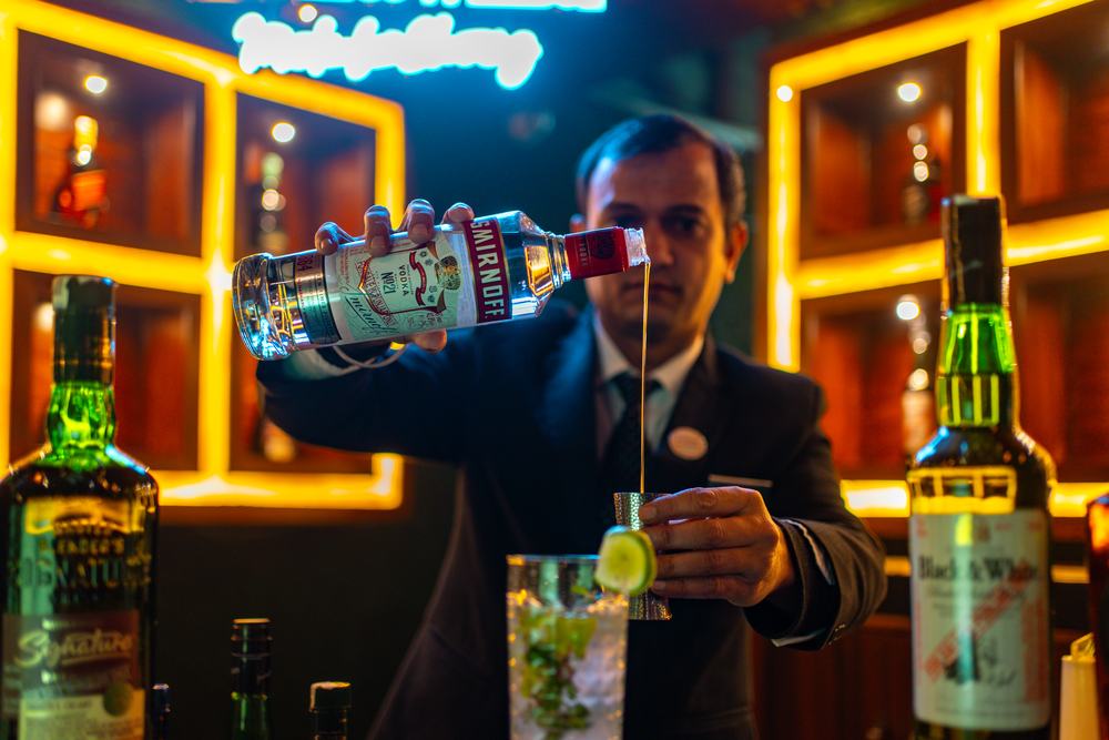 A bartender pouring at Bellers