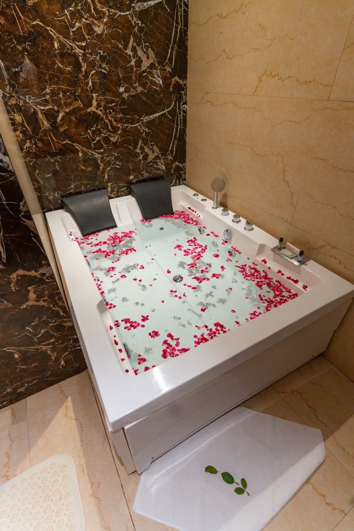 The bath drawn with rose petals