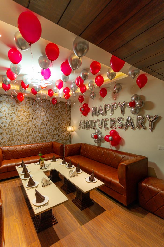 A private dining room dressed for an anniversary