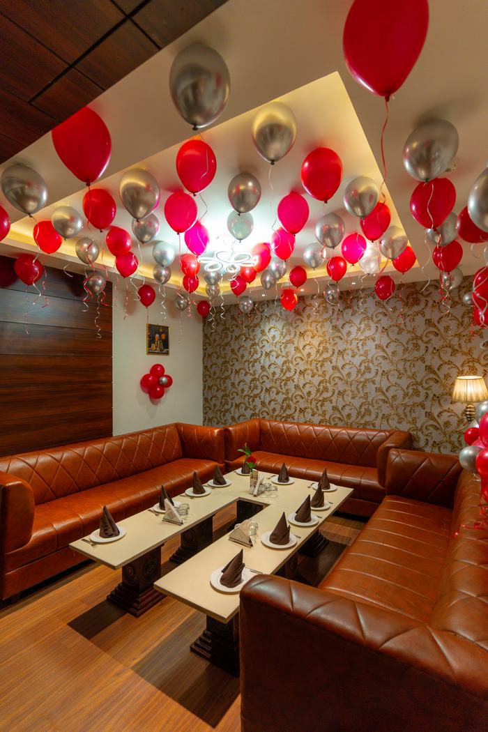 A private dining room laid for a family dinner
