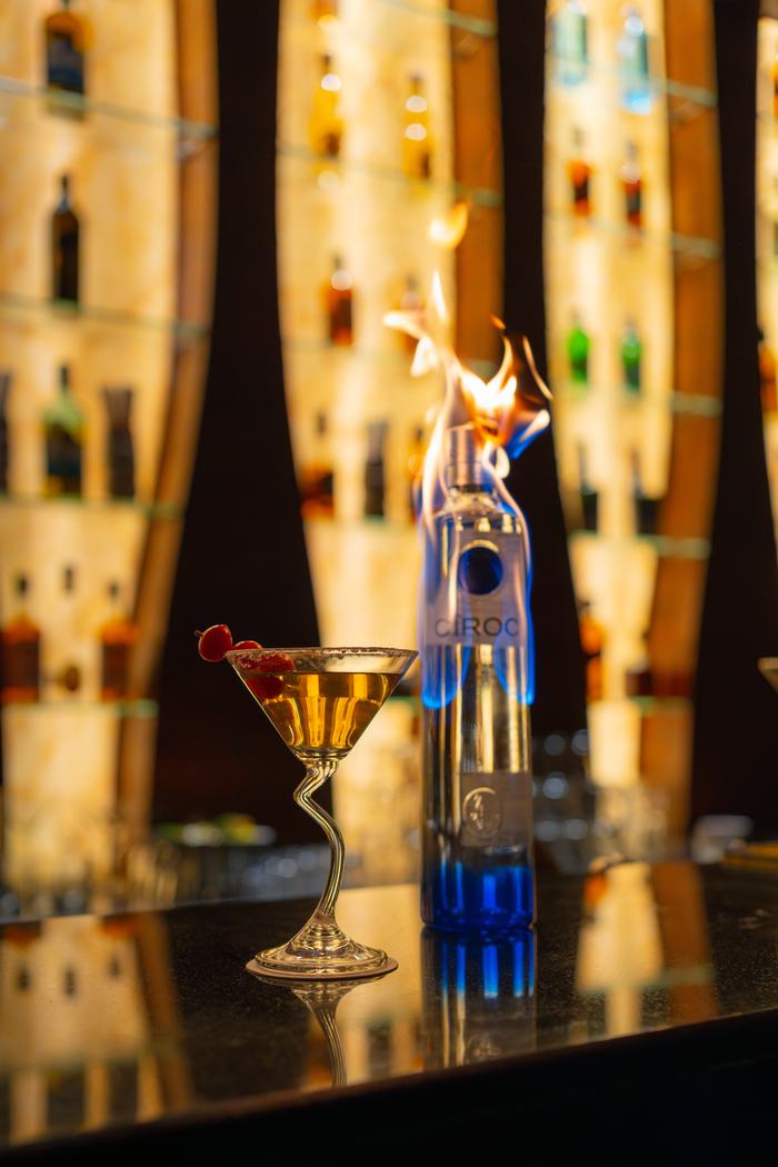 A cocktail finished with flame
