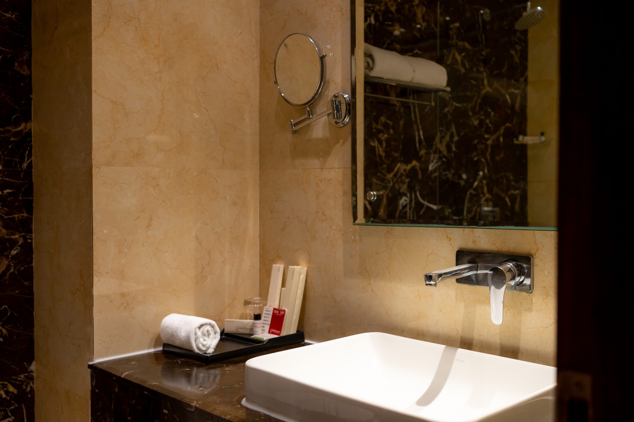Executive Room: The bathroom: vessel basin, mirror and amenities