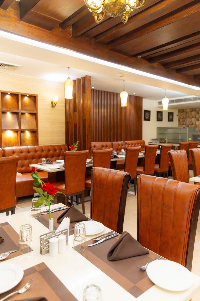 Galaxy, banquette seating and set tables