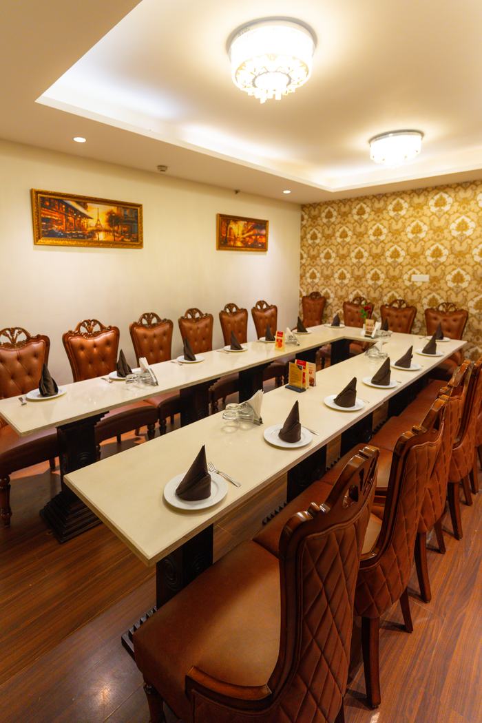 The hall set as one long boardroom table
