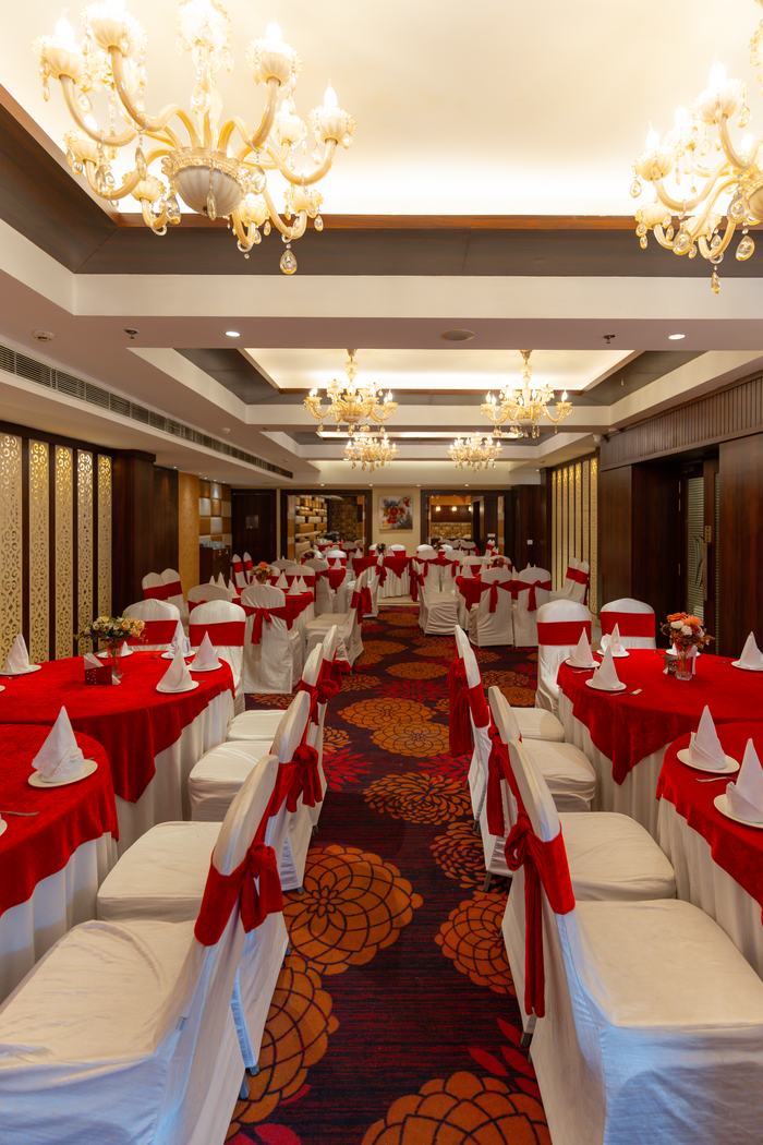 The hall laid in crimson and white