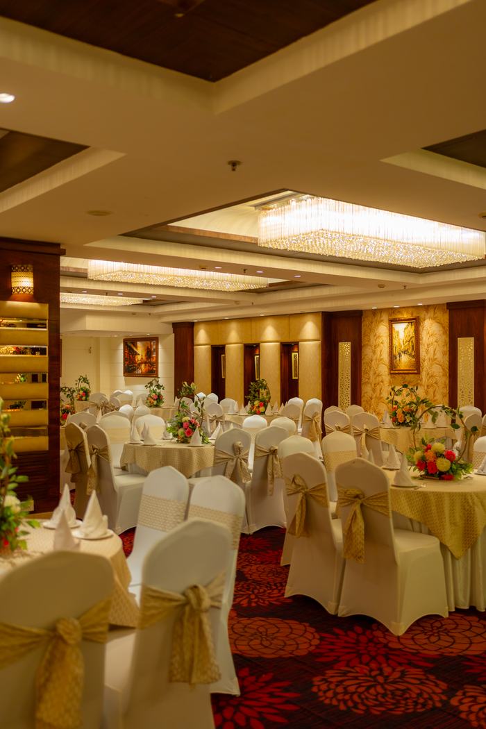 The hall dressed in cream and gold
