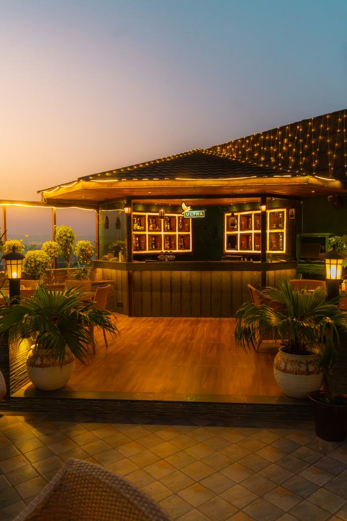 The Grand Barbeque, the rooftop bar as the light goes
