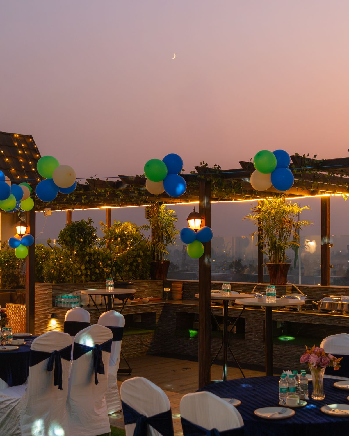 The terrace set for a function at sunset