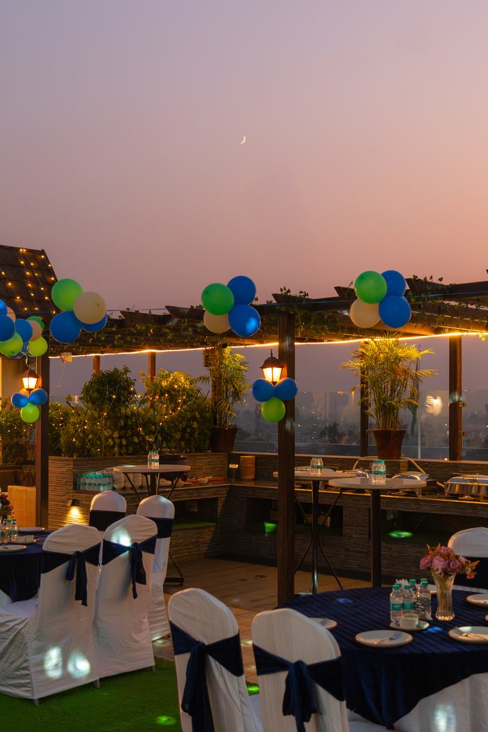 The terrace set for a function at sunset