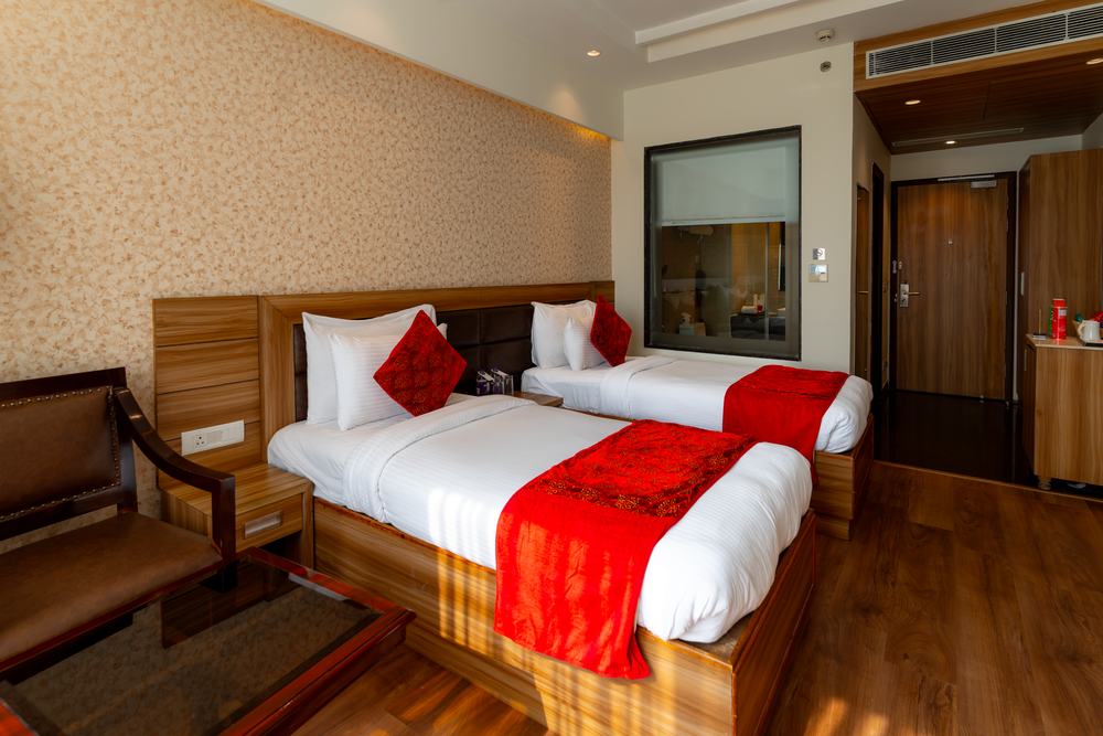 A Twin Room with its armchair and writing surface